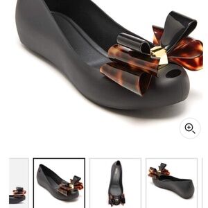 Brand new with box and dust bag Melissa jelly shoes size 8